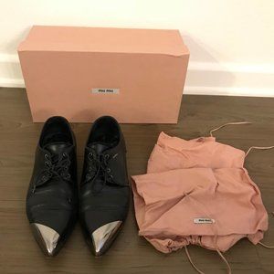 MiuMiu Black Leather lace up shoes, with silver metal embellishment